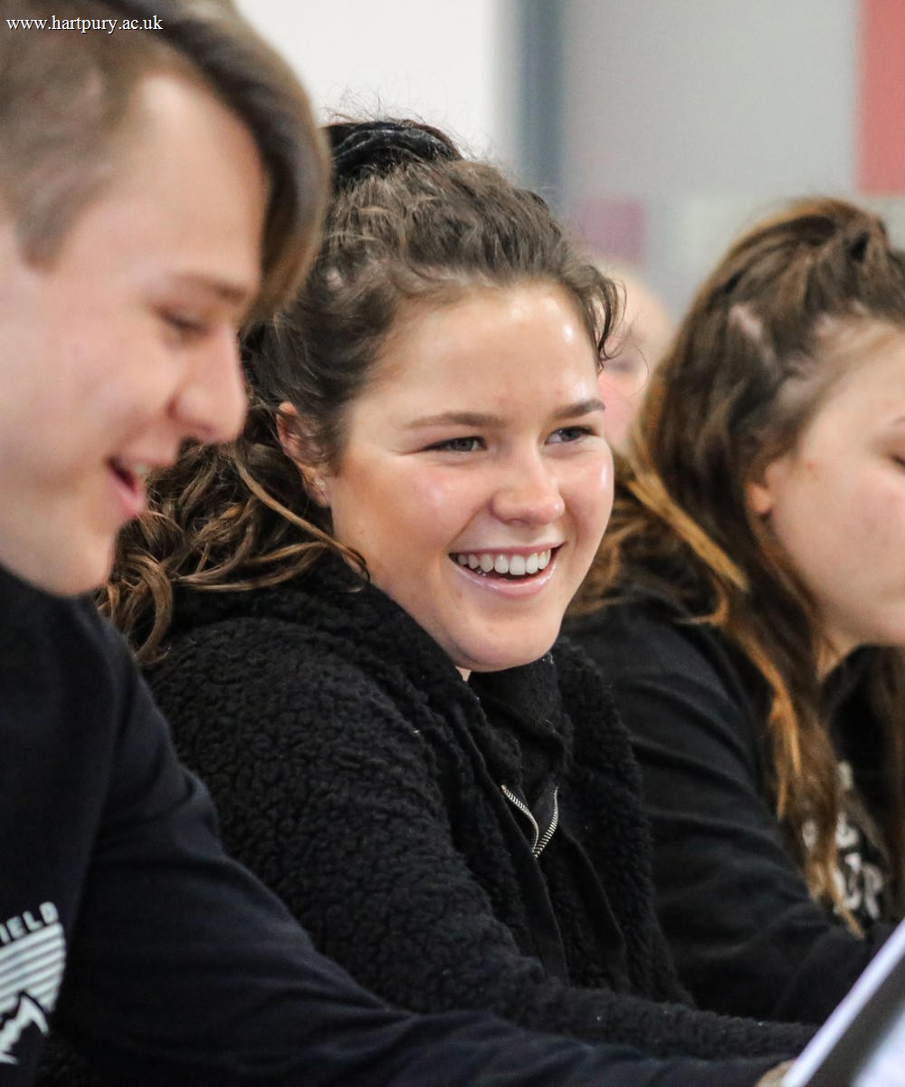 Image of students smiling in a lesson