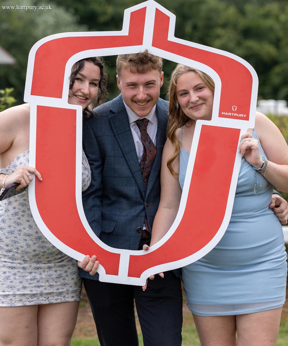 College Students Holding Selfie Frame At Prize Day (2)