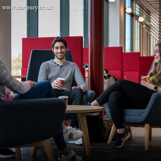 Three students drinking coffee in Graze