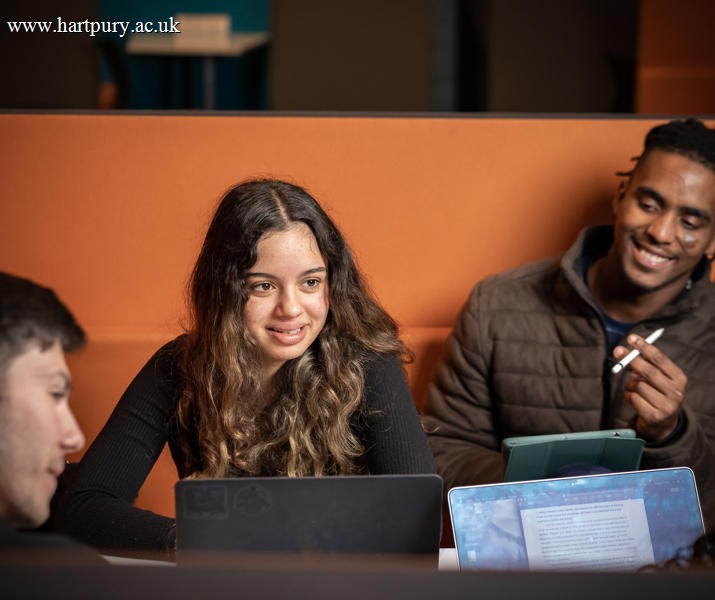 Group Of Students In Study Lounge