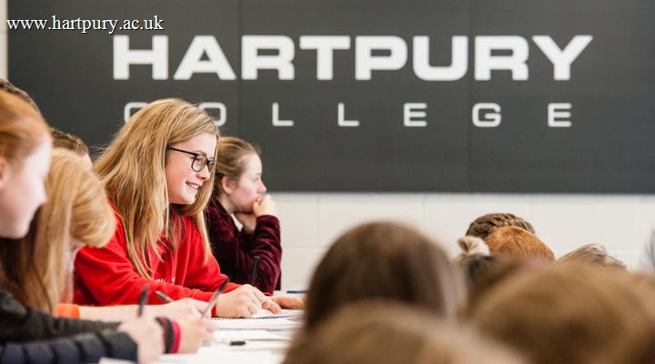Image of a group of students sat in a lecture theatre