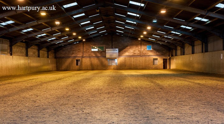 Indoor Arena At Hartpury With Lights On