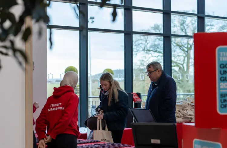 Student Ambassador Greets Guests At Open Event
